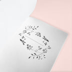 The first page of notebook has a small motif printed to write your name
